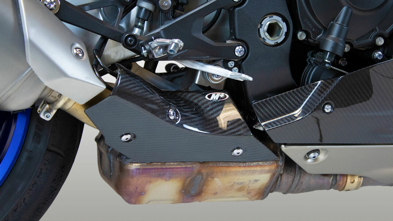 Motorcycle fairing heat shield